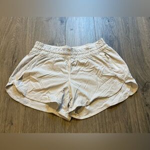 Lululemon Women’s Run Shorts White Cream Elastic Waist Zip Pocket Sz 12 – Flaws